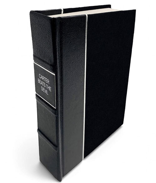 Carter Beats the Devil by Glen David Gold - All-Black Leather-Bound Book - angled front-and-spine hero view