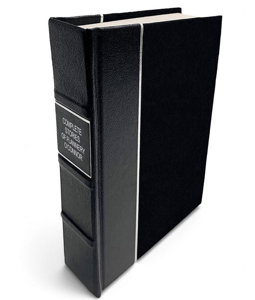 Complete Stories of Flannery O'Connor by Flannery O'Connor - All-Black Leather-Bound Book - angled front-and-spine hero view