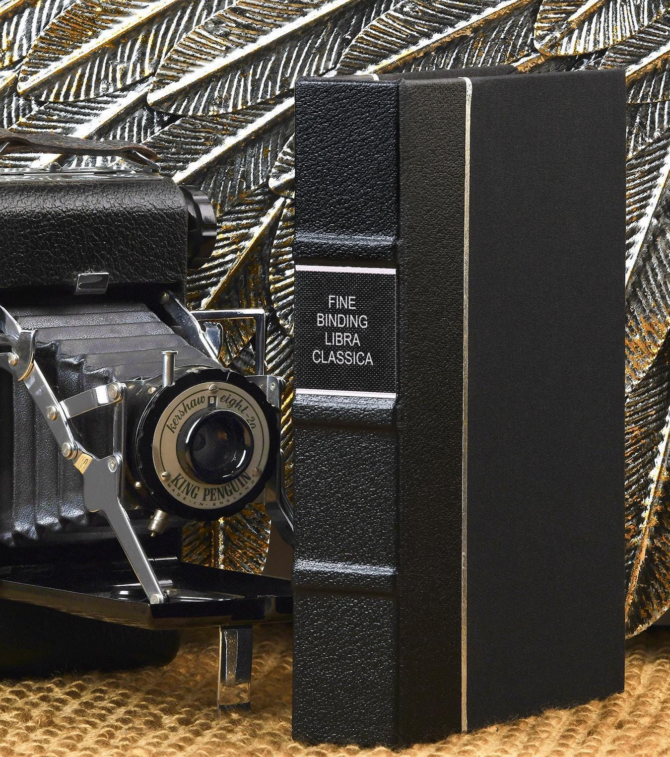 The Awakening by Kate Chopin - All-Black Leather-Bound Book - stylized in-situ view