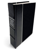 The Seven Deaths of Evelyn Hardcastle by Stuart Turton - All-Black Leather-Bound Book - angled front-and-spine hero view